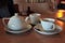 Tea set for two. Ð¡eramic teapot and cups with fragrant hot tea