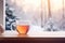 Tea and snow outside - a tranquil winter scene