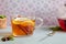 Tea time, Teapot and cups of tea on table