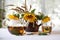 Tea in a transparent teapot and sunflowers in a ceramic vase