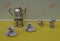 Tea for two, english teacups, saucers, silver-plated teapot on a silver stove, spoon vase, teaspoon, cream jug, with floral decor