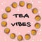 Tea vibes poster with cups of camomile tea. Hand drawn cartoon style postcard, cute wreath ornament design