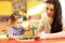 Teacher and baby one year ago playing logical toys in nursery