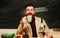 Teacher bearded man drinking tea chalkboard background. Relax concept. College and high school teacher. Self care and