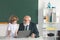 Teacher and child in classroom. Education concept. School learning concept. Boy elementary school. Old and Young