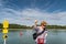 The teacher conducts safety lessons near an open reservoir