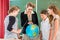 Teacher educate students having geography lessons in school