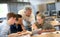 Teacher with group of carpentry students during class