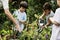 Teacher and kids school learning ecology gardening