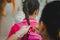 The teacher prepares the student`s hair before returning home.