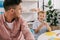 teacher and red hair preschooler with plasticine sculpturing figures at table