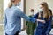 Teacher and schoolgirl having an elbow greeting during pandemic