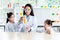 Teacher Scientific experiments are being performed for children students Using balloons and water bottles