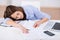 Teacher Sleeping At Classroom Desk