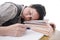 Teacher sleeping on a pile of books