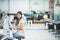 Teacher teach keyboard electone instument to a boy in the class room