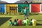 Teacher teaching about green energy and recycle in playground at schoolyard