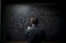 Teacher or university professor writing mathematics calculations on blackboard during class