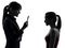 Teacher woman mother teenager girl discussion in silhouette
