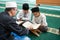 Teaching muslim kid to read quran