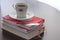 Teacup on books with pink bookmark