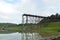 Teak wood bridge destroy by force of water in Thailand