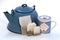 Teakettle, tea bags in sizes, teacup with lid