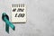 Teal awareness ribbon and notebook with hashtag METOO on grey background, flat lay. Stop sexual