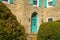 A Teal Door on a Cobblestone House