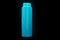 Teal shampoo bottle with no labels. Isolated on a black background. The product cap is closed