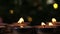 Tealight candles flickering with bokeh background