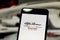 Team Alfa Romeo Racing Formula 1 logo on the mobile device screen. Alfa Romeo Racing contests the world motorsport championship