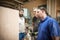 Team of carpenters making furniture in a workshop