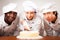 Team Of Confectioners With Gateau