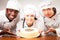 Team Of Confectioners With Gateau