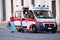 Team of doctors near the abulance car on Piazza Navona in Rome