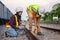 Team engineer holding wrench for repair working on train site, safety, civil, workers