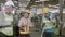 Team of engineer smiling and dancing in industrial factory with happy.