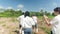 Team of Farmer Walking in a field and talking on quality inspection