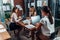 Team of female managers discussing business strategy during briefing in office