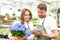 Team of florist working together at the plants nursery