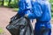 Team group of young people, girls and boys volunteering and participate in community work cleaning day, activists collecting waste