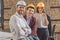 team of happy architects in hard hats looking