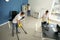 Team of janitors cleaning office