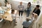 Team leaders meet multiracial interns in coworking office, top v