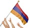 Team of peoples hands raising the Armenia national flag