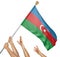 Team of peoples hands raising the Azerbaijan national flag