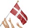 Team of peoples hands raising the Denmark national flag