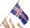 Team of peoples hands raising the Iceland national flag