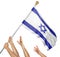 Team of peoples hands raising the Israel national flag